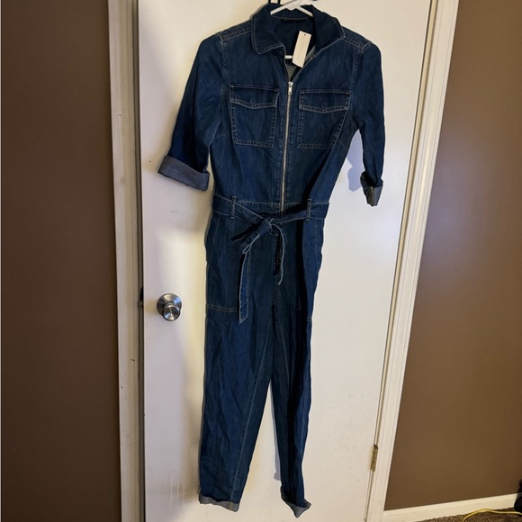 Jean jump suit with pocket and zips - Picture 2 of 5